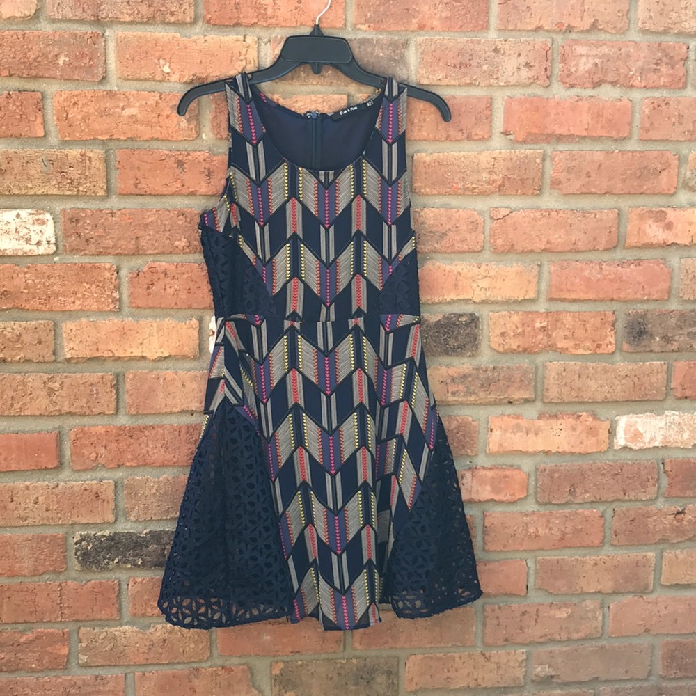 Sleeveless chevron dress with lace sides